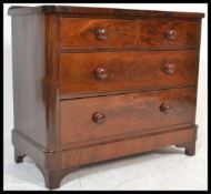 A 19th Century Victorian mahogany two over two chest of drawers. The bank of drawers raised on