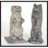 Two 19th century silver plated white metal novelty desk salts in the form of begging dogs.