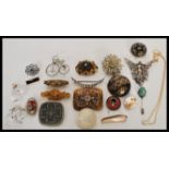 A collection of vintage 20th Century jewellery to include a pressed Tortoiseshell Pique brooch,