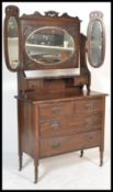A late 19th Century Victorian mahogany batwing dressing table - chest of drawers having two over two
