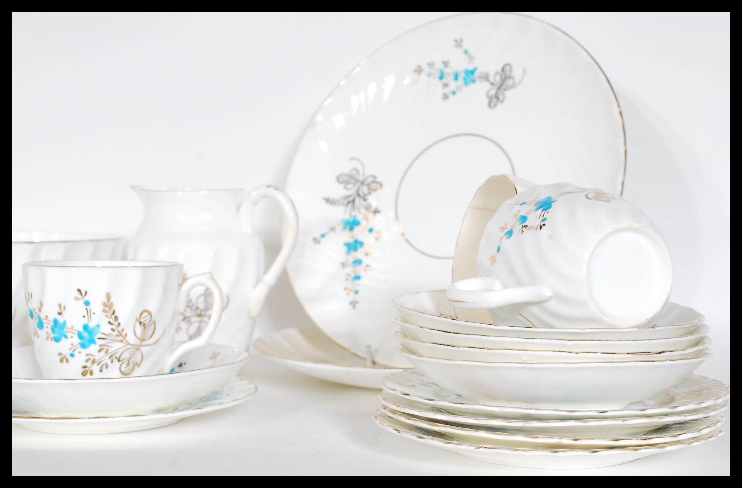 An early 20th Century ten person fine English bone china tea service consisting of ten fluted cup - Image 3 of 5