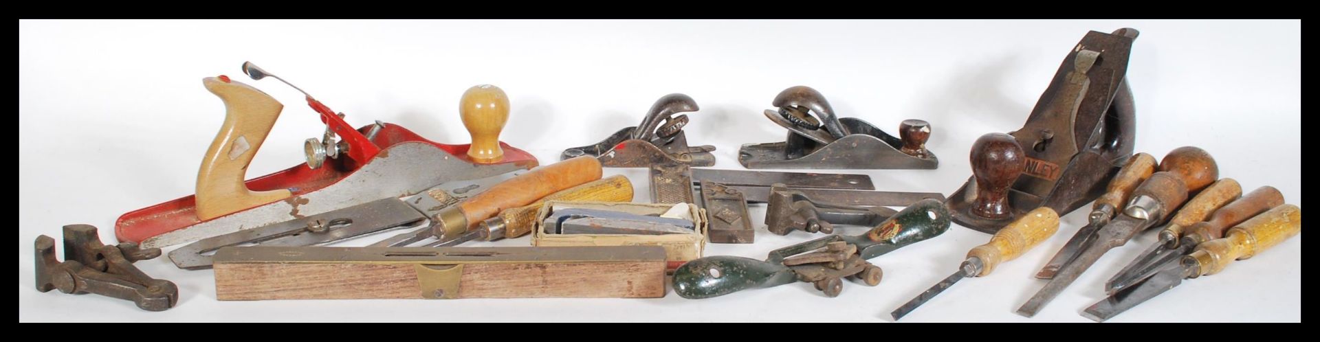 A collection of vintage 20th Century woodworking tools to include planes Acorn, Stanley, Chistles