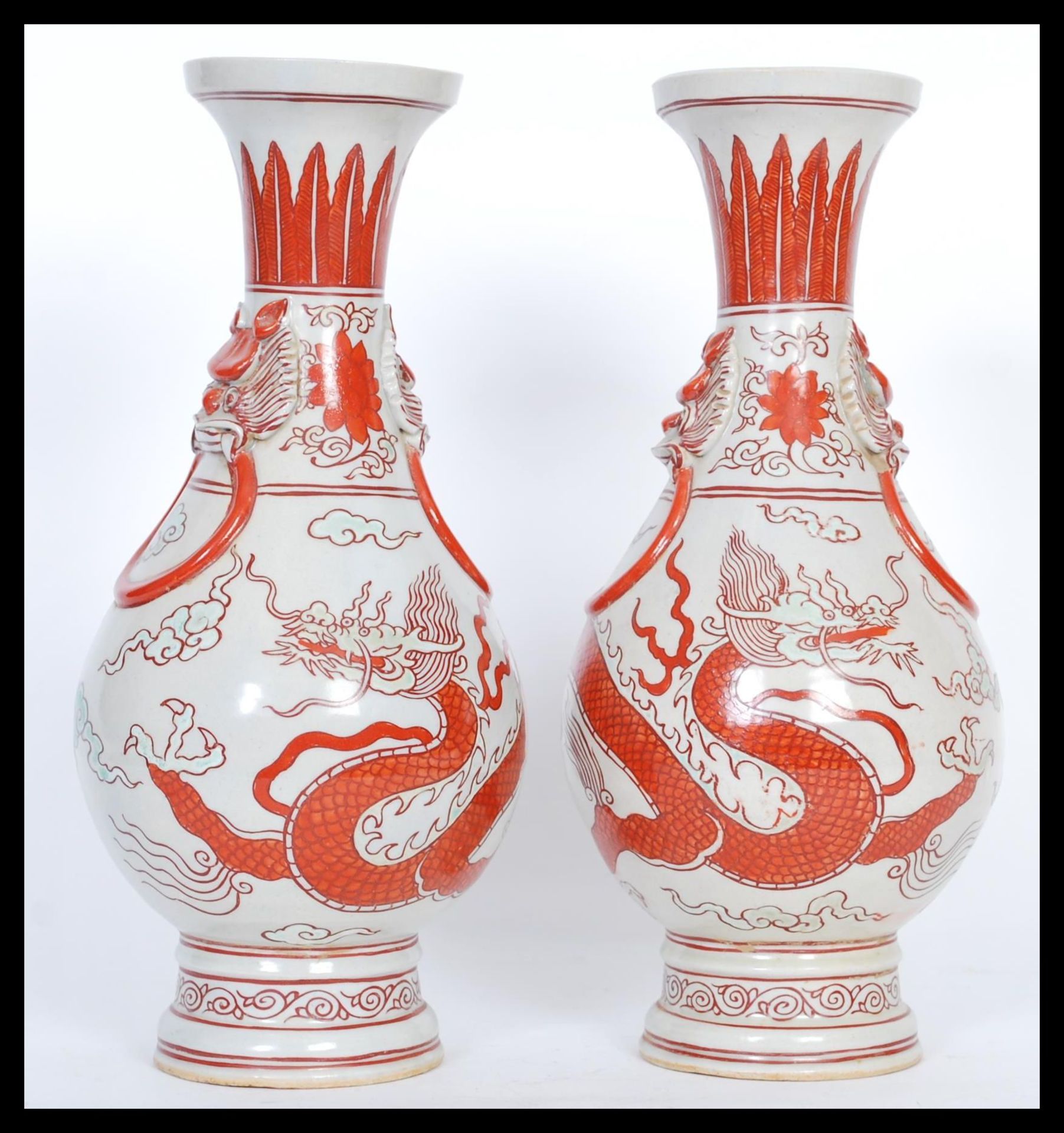 A pair of 20th Century Chinese baluster vases raised on a large circular foot with ring Fu /