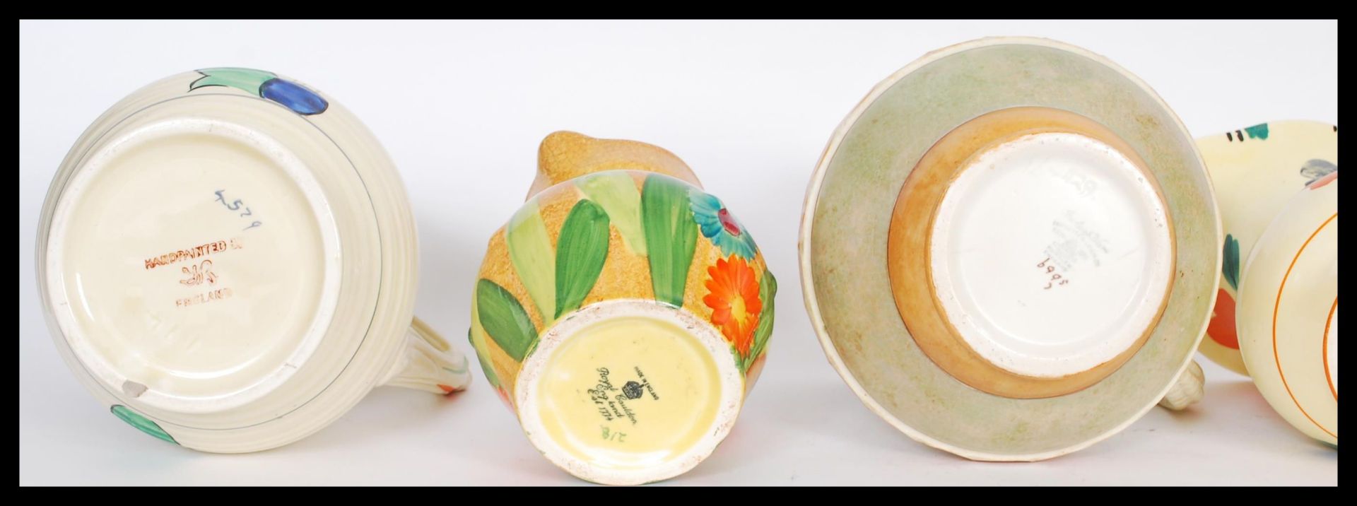 A selection of mid 20th Century hand painted ceramic jugs to include a burleigh ware jug having a - Bild 5 aus 6