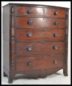 A 19th Century Victorian Scottish bow front mahogany chest of drawers raised on bracket feet. The