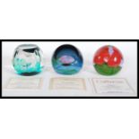 A group of three 20th Century Caithness Scotland Glass limited edition paperweights comprising of