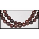 A vintage early 20th Century Chinese / Tibetan 108 bead prayer necklace mala of typical form.
