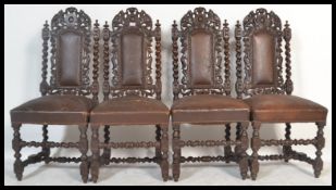 A set of four late 19th Century Victorian carved oak dining chairs in the Carolean style, each