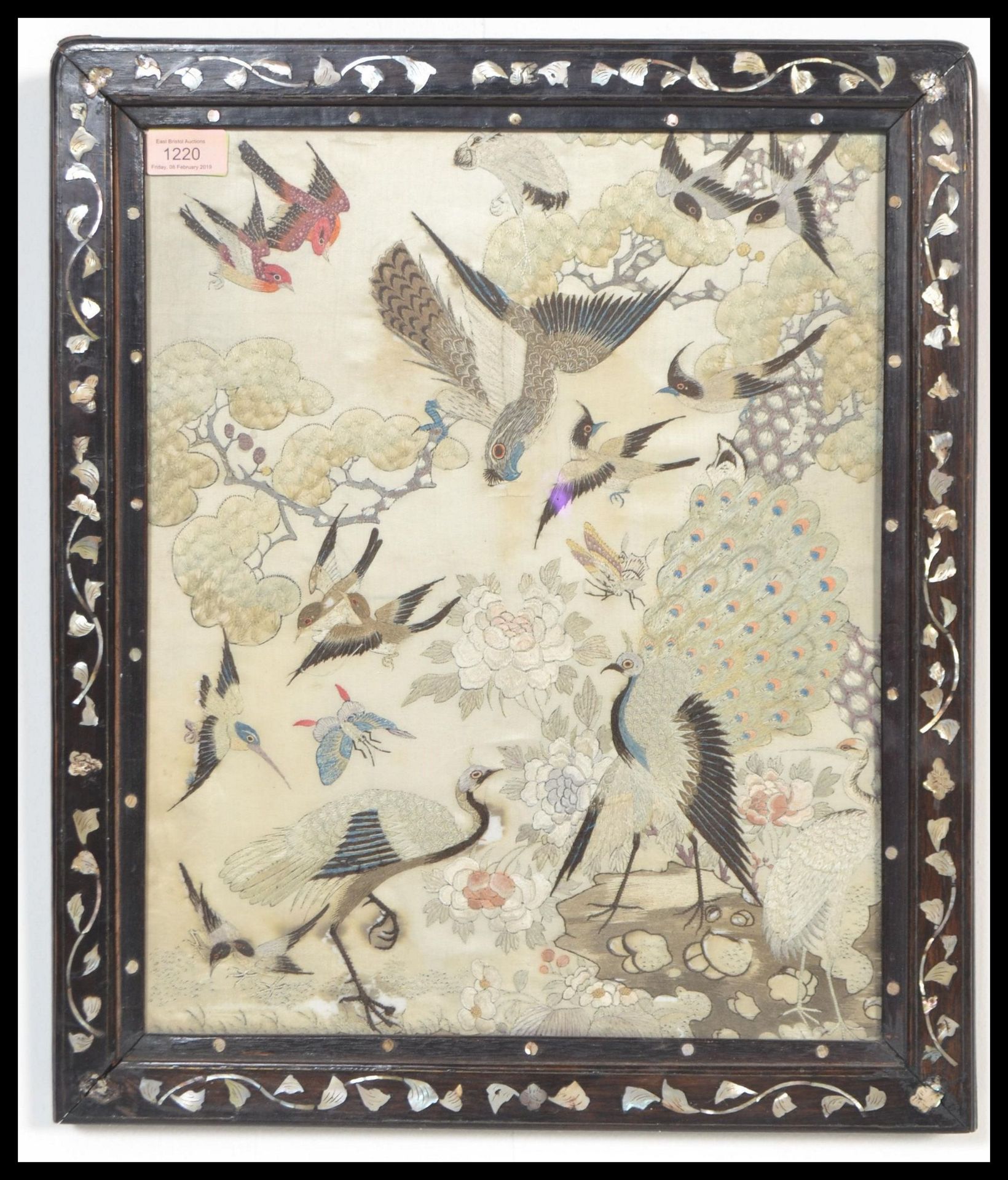 A 19th Century Chinese silk panel having intricate decoration of birds of paradise including