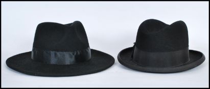 A vintage gents moleskin Trilby hats with band set to the hat together with another vintage Fedora