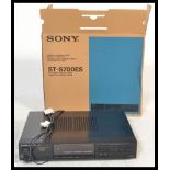 A retro 20th Century Sony ST - S700ES stereo tuner receiver retaining original Sony box. With