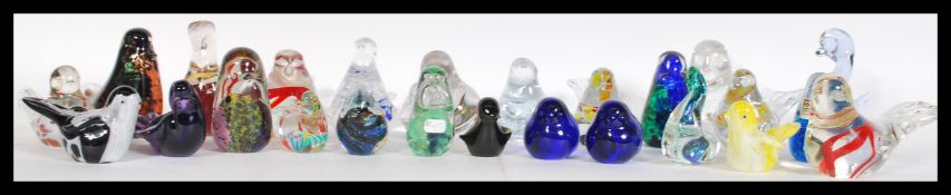 A collection of approx 25 studio art glass paperweights in the form of birds to include aventurine