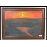 A framed and glazed mid 20th Century abstract oil on board painting depicting a sunset / sunrise.