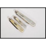 A group of three hallmarked silver and mother of pearl fruit pen knives consisting of a 19th Century