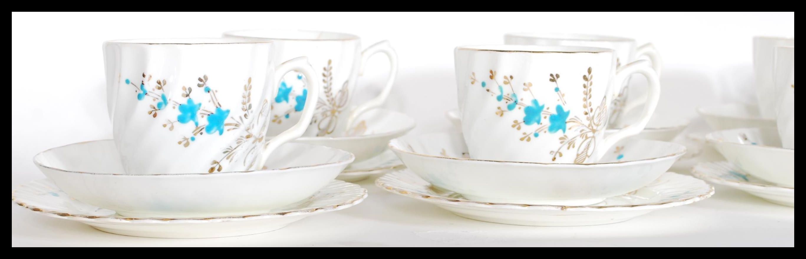 An early 20th Century ten person fine English bone china tea service consisting of ten fluted cup - Image 2 of 5