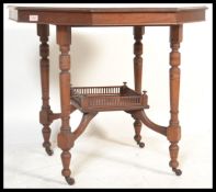 A Victorian late 19th century mahogany octagonal top centre table, the turned and shaped supports