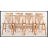 A set of four vintage retro 20th century Ercol style beech and elm Windsor dining chairs having