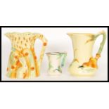 Three early 20th Century Burleigh Ware Art Deco jugs / ewers to include a water jug modelled on a