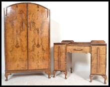 An early 20th Century 1930's Art Deco walnut bedroom suite, consisting of a twin pedestal kneehole