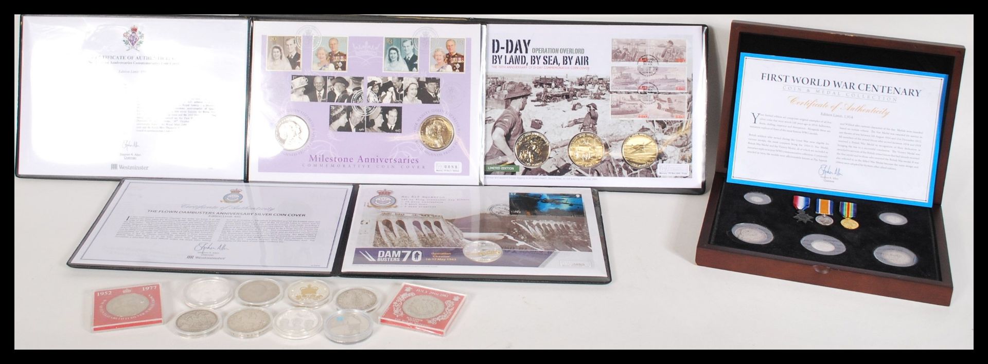 A collection of silver proof and other coins to include a Westminster The Flown Dambusters