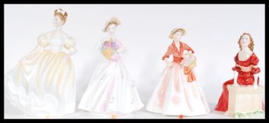 A collection of four ceramic figurines to include Royal Worcester Sarah modelled by Doughty,