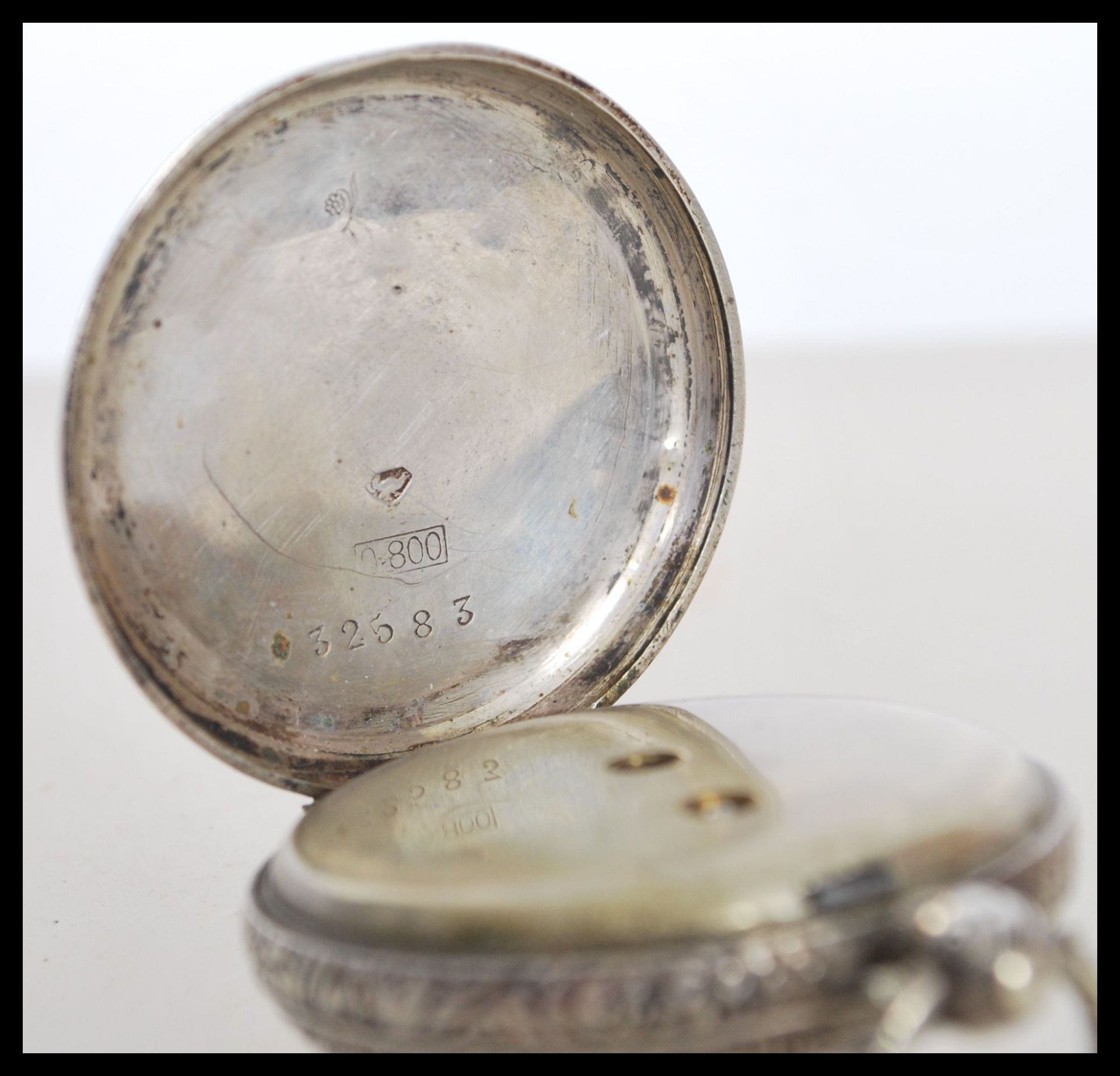 An early 20th Century continental silver fob pocket watch having engraved foliate decoration to - Bild 4 aus 6