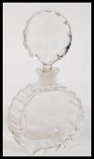 An early 20th Century Art Deco large faceted glass perfume bottle with etched decoration of
