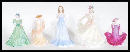 A group of five ceramic figurines to include Royal Doulton Pretty Ladies Lynette, Doulton