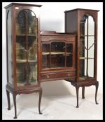 An early 20th Century Edwardian mahogany drop centre astral glazed china display cabinet.  Above,