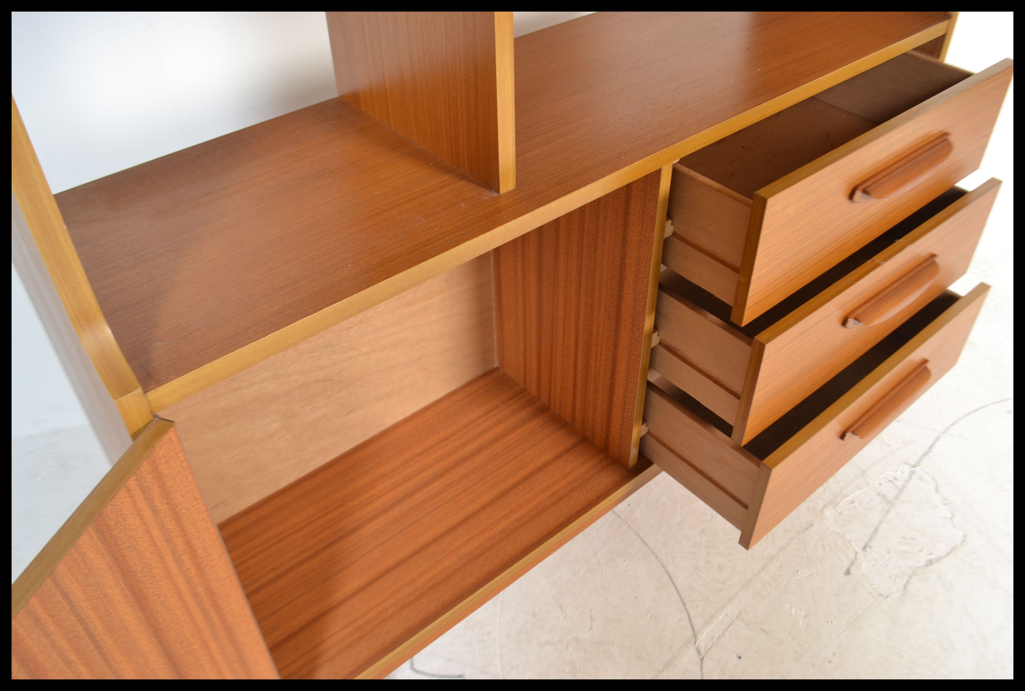 A 1970's Danish influence teak veneer freestanding room divider  with configuration of open shelves, - Image 5 of 7