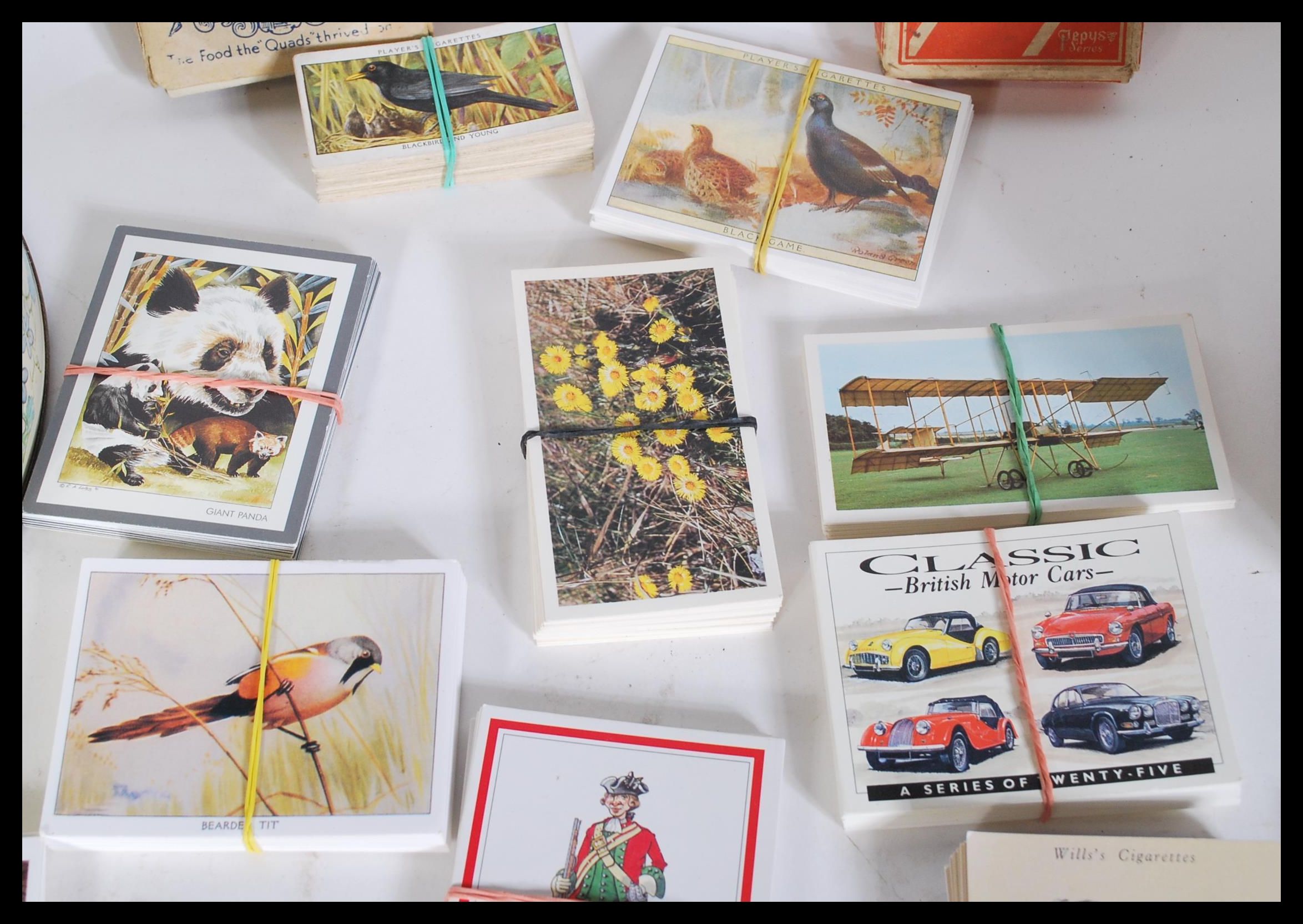 A collection of vintage cigarette cards to include part sets and odds. Players, Wills etc present. - Image 3 of 5