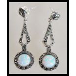 A pair of sterling silver CZ and opal drop earrings set with marcasites in the Art Deco style.