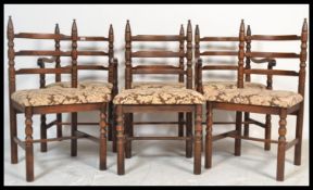 A set of six 20th Century oak ladder back dining chairs possibly by Jaycee furniture, over stuffed