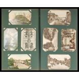 An early 20th Century collection of postcards contained within a brown postcard album to include