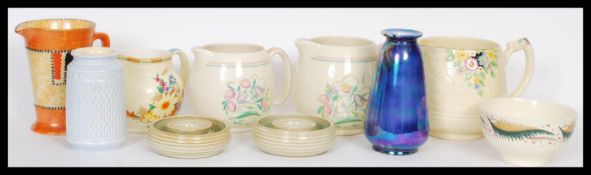 A selection of 20th Century ceramics to include a Crown Ducal Art Deco jug having orange geometric