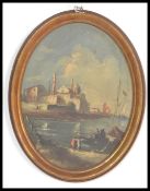 A 19h Century Italian oval oil painting depicting the Grand Canal Venice set to an oval gilt