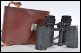 A rare vintage pair of Carl Zeiss Jena Jenoptem Multi-coated 8x30w binoculars 5334055 complete in