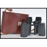 A rare vintage pair of Carl Zeiss Jena Jenoptem Multi-coated 8x30w binoculars 5334055 complete in