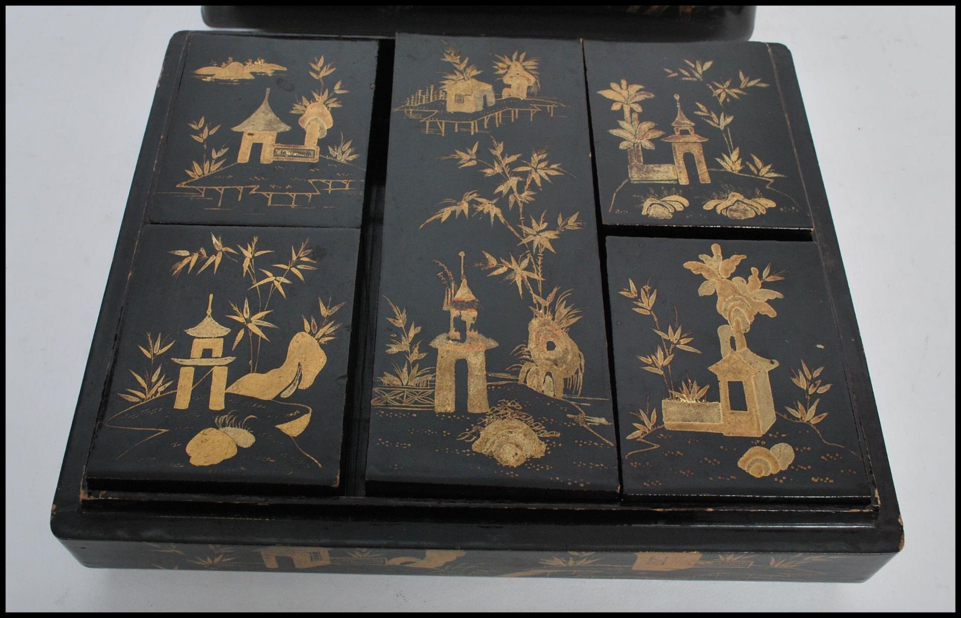 A late 19th century Chinese black lacquered and gilt games box with a detachable lid, enclosing five - Bild 3 aus 5