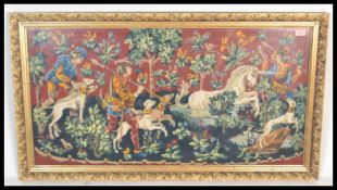 A 20th Century large French Tapestry depicting the Unicorn Hunt based on the original from the
