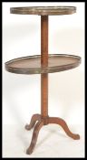 A late 19th Century / 20th century french two tier Kingwood and brass gallery dumbwaiter etagere.