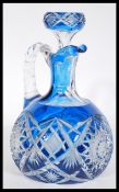A good quality Bohemian glass decanter ewer jug in cobalt blue having star cut decoration with