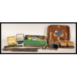 A selection 20th Century vintage gentleman's grooming set within a leather case including clothes