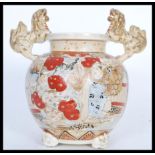 A Chinese urn / vase of bulbous form having hand painted scenes of people in traditional dress