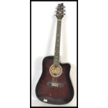 Brunswick Rodeo series six string acoustic guitar with steel strings and deep waisted tapered body