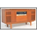 A retro 20th Century teak wood radiogram sideboard, fitted with a Ferguson radio receiver and a
