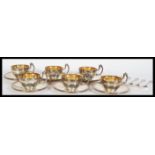A 20th Century hallmarked Portuguese silver coffee service to include six coffee cups and saucers