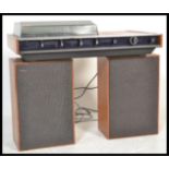 A Stunning retro 1970's PrinzSound stereo system 6DL. Having a teak case, offset smoked lidded