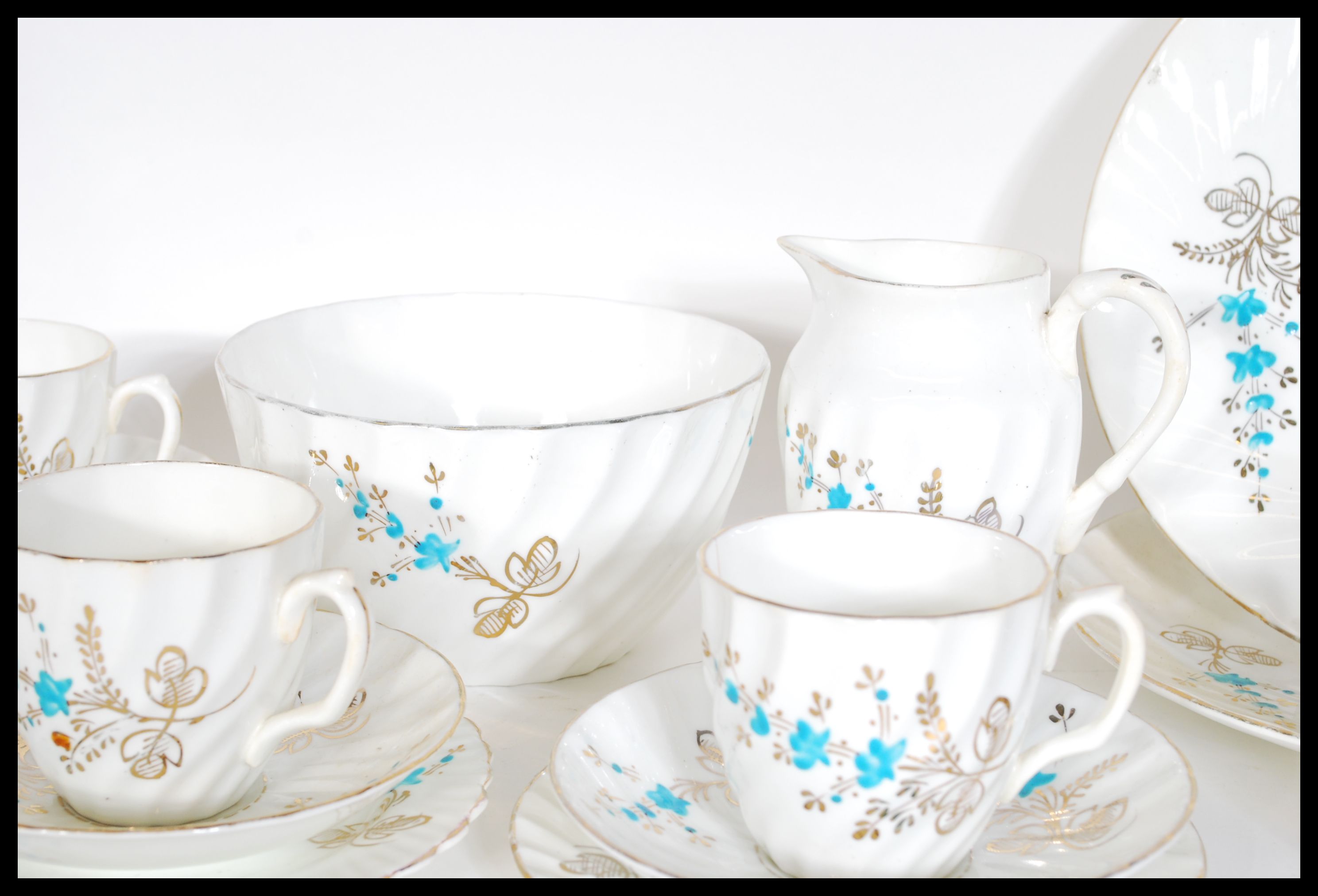 An early 20th Century ten person fine English bone china tea service consisting of ten fluted cup - Image 4 of 5