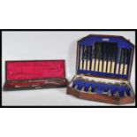 A John Hall Ltd, stainless steel cutlery canteen for six set within a wooden case, along with a